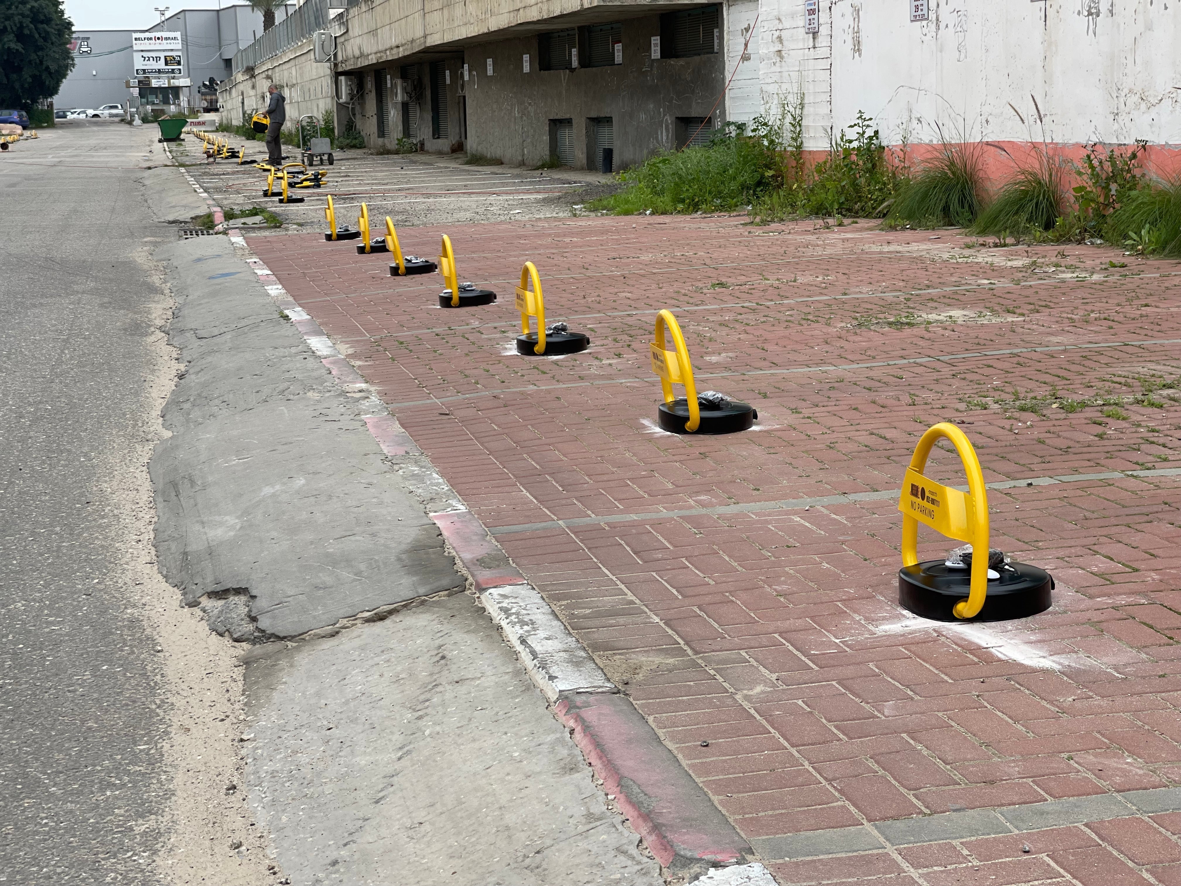 Several parking barriers installed in one row